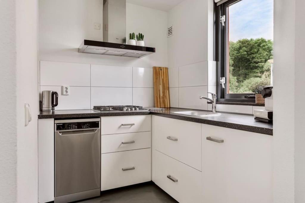 Vakantiehuis Aan Het Water -Incl Laadpaal- Ewijk Esterno foto